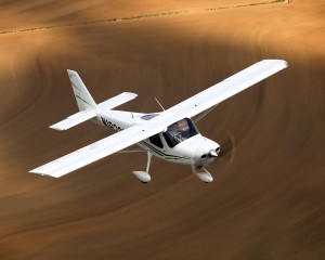 Cessna Skycatcher flying above the desert