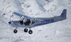 STOL flying above the snow covered ground